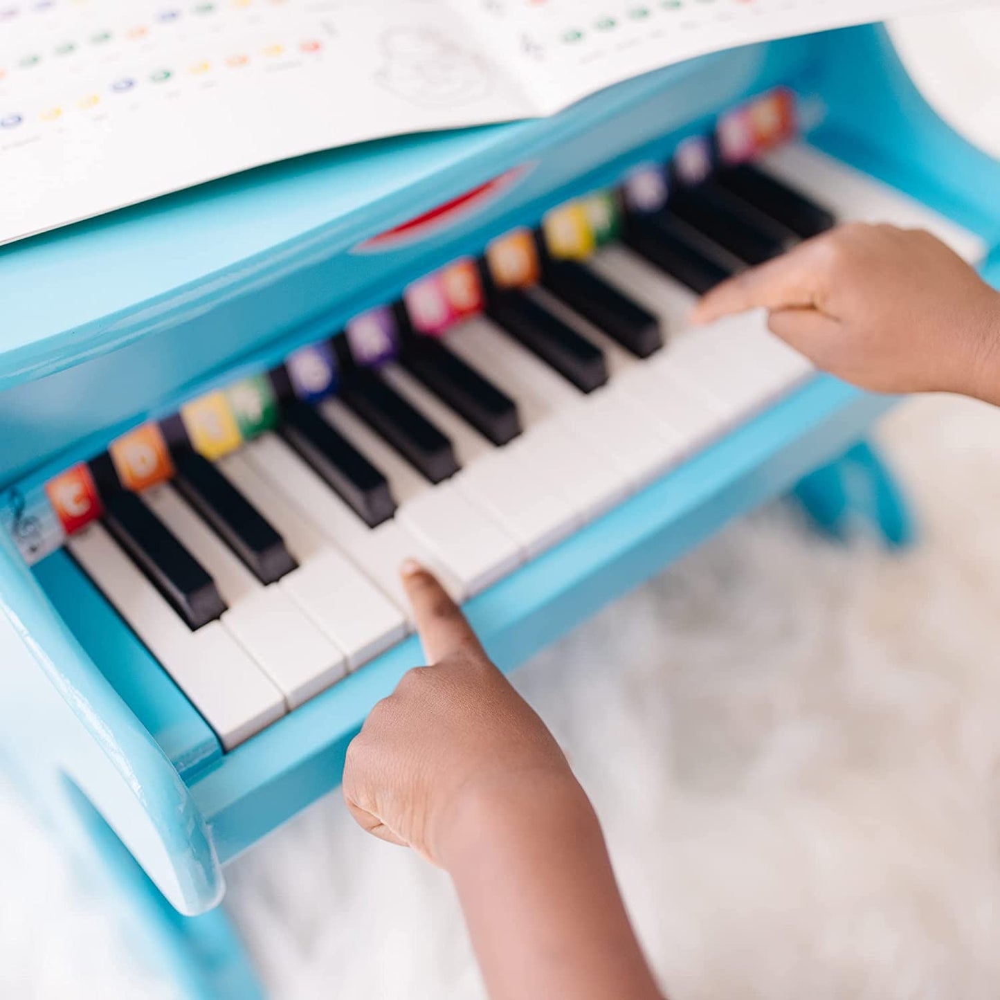 Piano with 25 keys and color-coded songbook, (Blue)