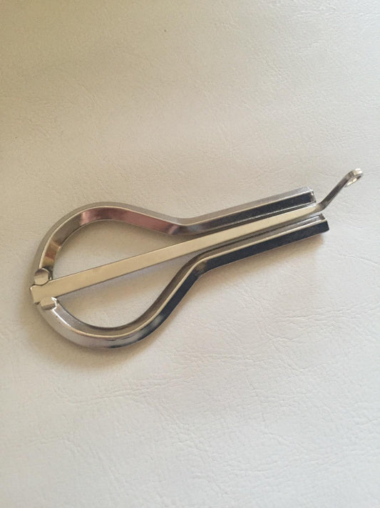 Jaw harp, item dimensions 8.5 x 1.5 x 4.5 inches