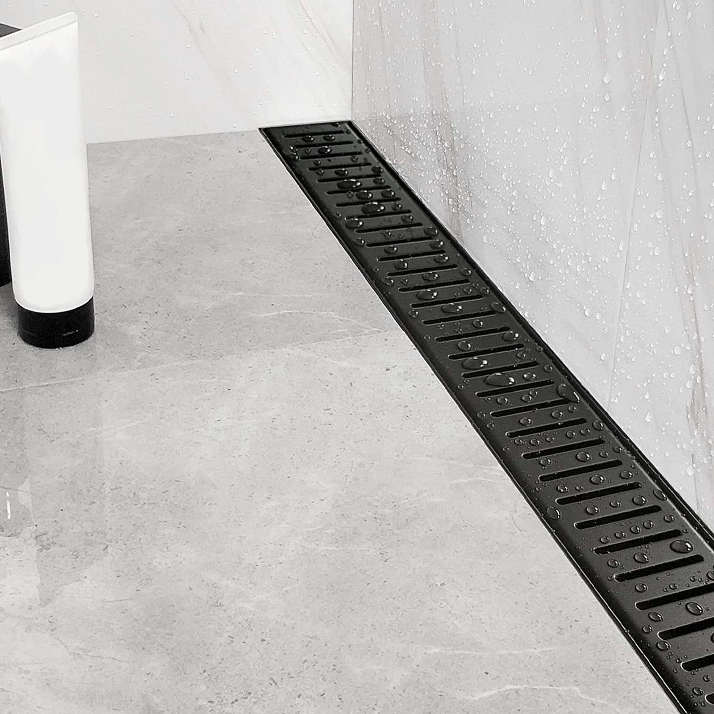 24" linear shower drain with removable capsule pattern grate