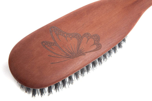 hair brush (with a butterfly)