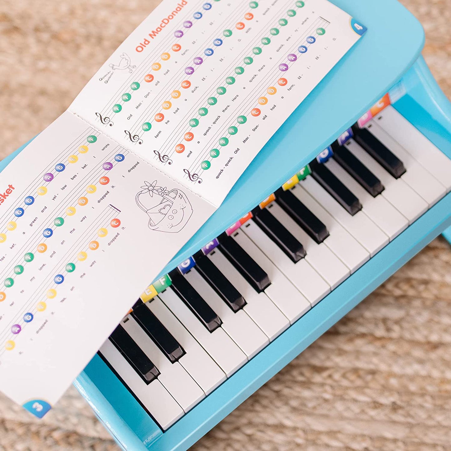 Piano with 25 keys and color-coded songbook, (Blue)