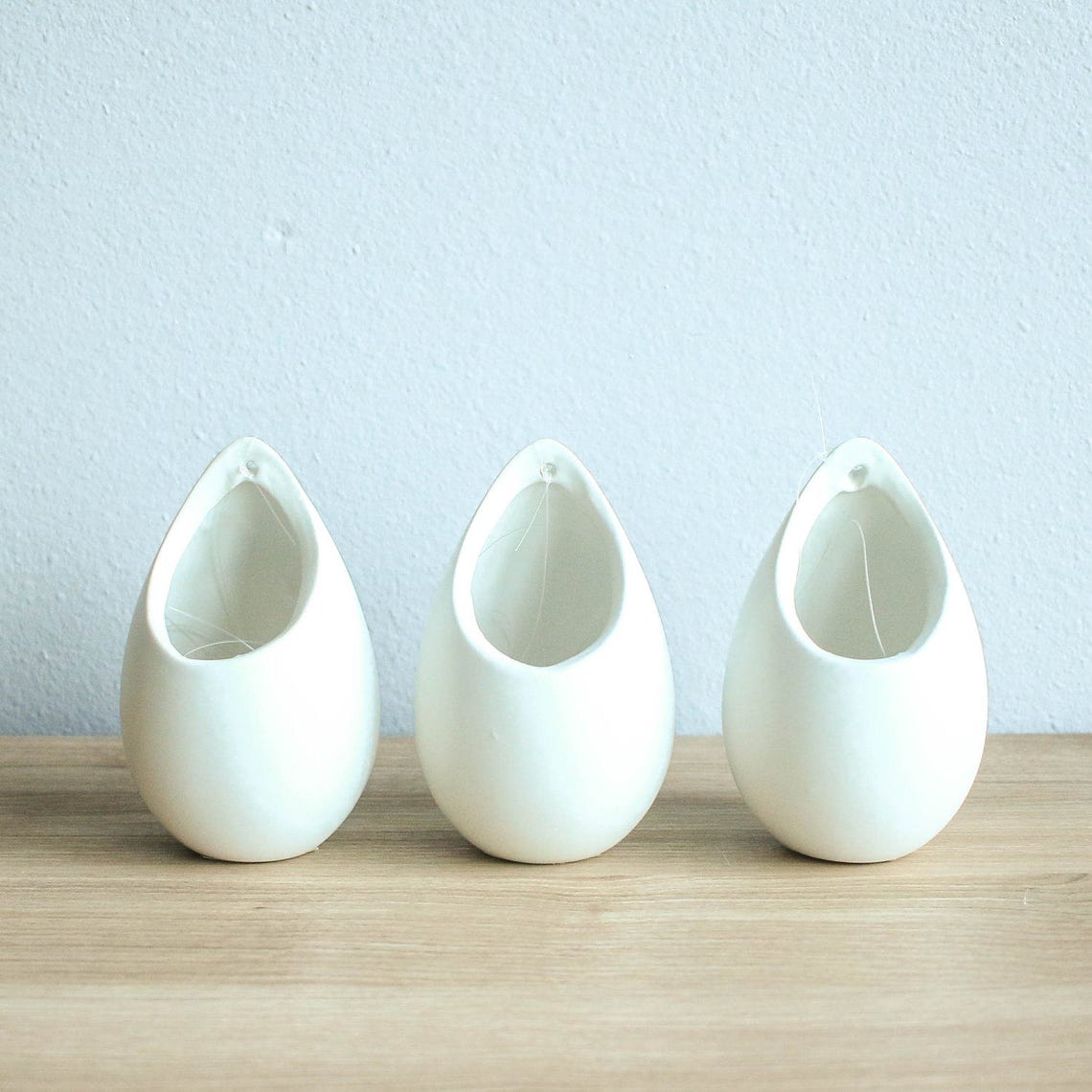 3 large ivory ceramic vases