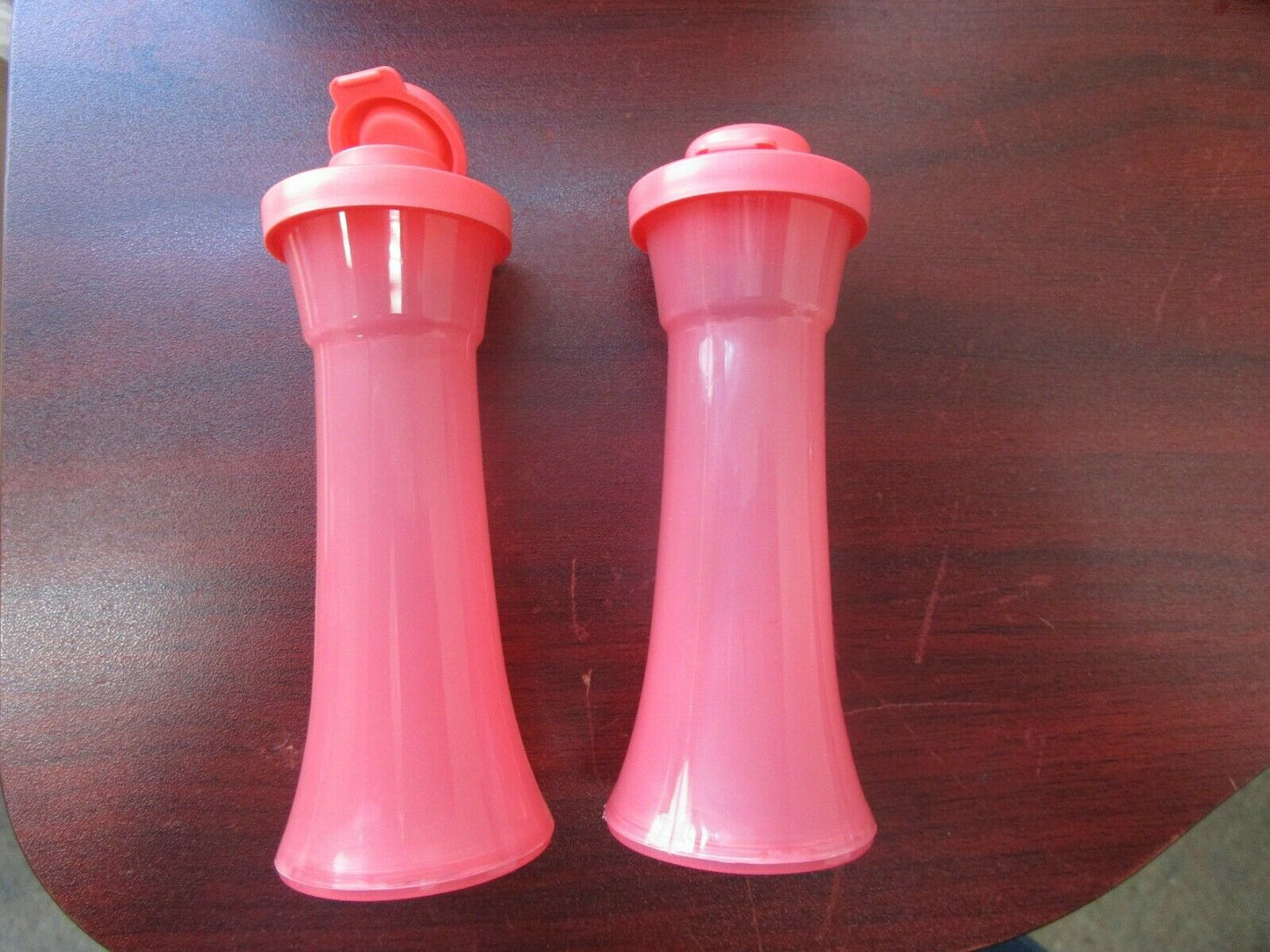 Guava colored "hourglass" salt and pepper shakers, 2 pieces